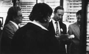 THE DOUBLE REED 85 Maurice Allard (L) with Bill Waterhouse (C) and Gerry Corey (R) viewing Waterhouse s instrument collection in Edinburgh at the IDRS Conference, August 1980.