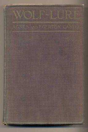 9. Castle, Agnes and Egerton. Wolf-Lure. New York: D. Appleton and Company, 1917. First American edition. 414pp. Duodecimo [19 cm] Very heavily faded lavender cloth over boards with gilt lettering.