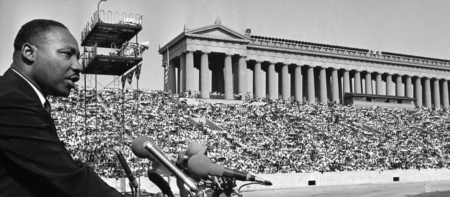 Dr. King addresses 70,000 people at Chicago s Soldier Field in 1964. You may know that Dr.