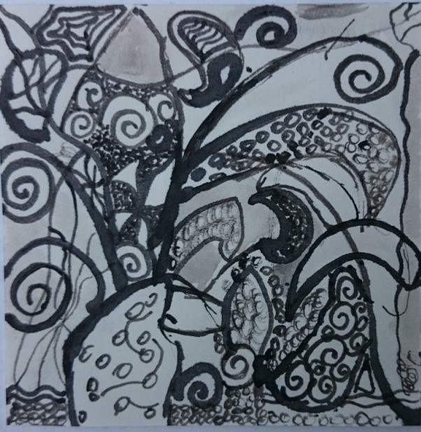 Slika 84: Učenec U 32 transformira tipično šablonsko obliko cvetja in ga s črtno risbo tudi nariše.