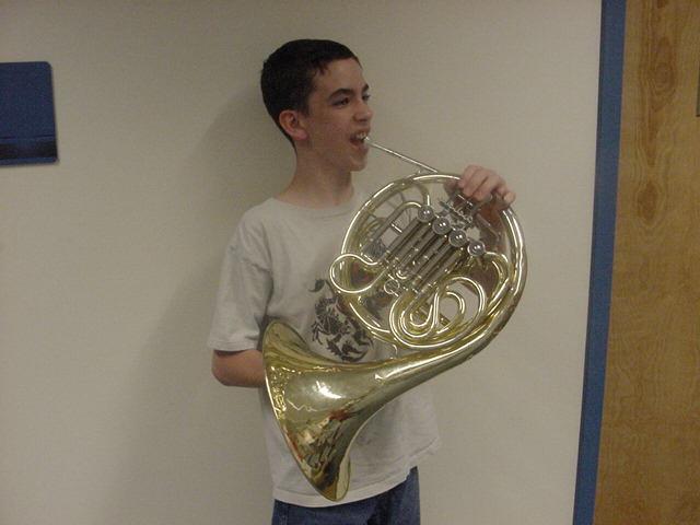 The FRENCH HORN has a very mellow and beautiful tone. It is played in a similar way to the trumpet, but held differently.