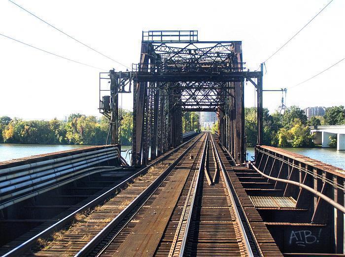 The Long Bridge Two-track steel truss railroad bridge constructed in 1904 Owned by CS Transportation (CST)