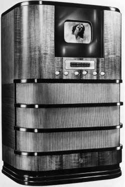 B. How was the first television different from today s television? Study the photograph below. Use the comparative forms in the Word Box to write three sentences.
