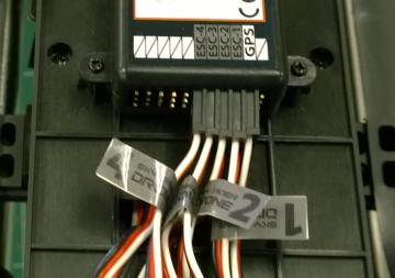 position the adhesive tags on the ESC plugs, matching the numbering sequence.