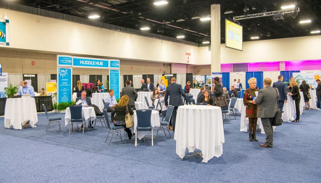 Platinum Level NEW! Networking Lounge and Closing Breakfast on the Tradeshow Show A branded Florida Huddle networking lounge on the tradeshow floor, featuring carpet, couches and tables.