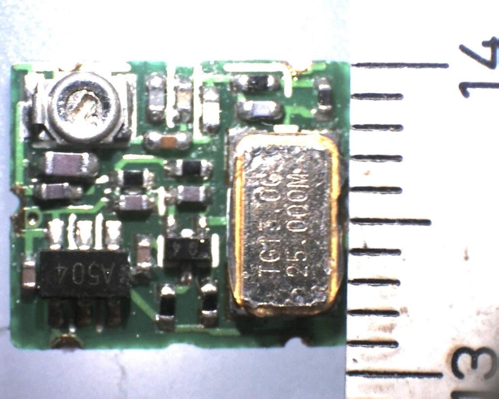 Note the variable capacitor in the top left corner, which allows for fine tuning the output frequency.