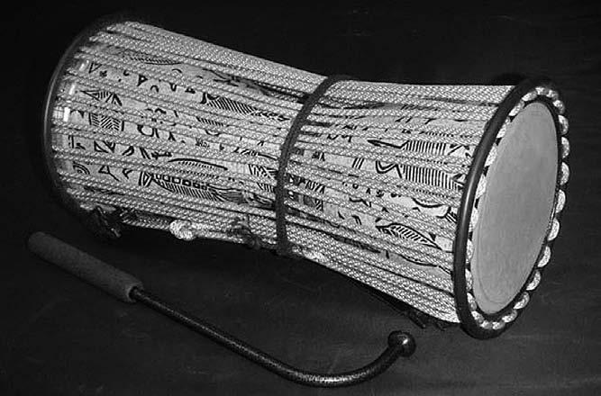 Learning Bank: Arican Talking Drum: One o the most unique drums in the world the West Arican talking drum does something ew instruments can do a layer can actually make it talk!