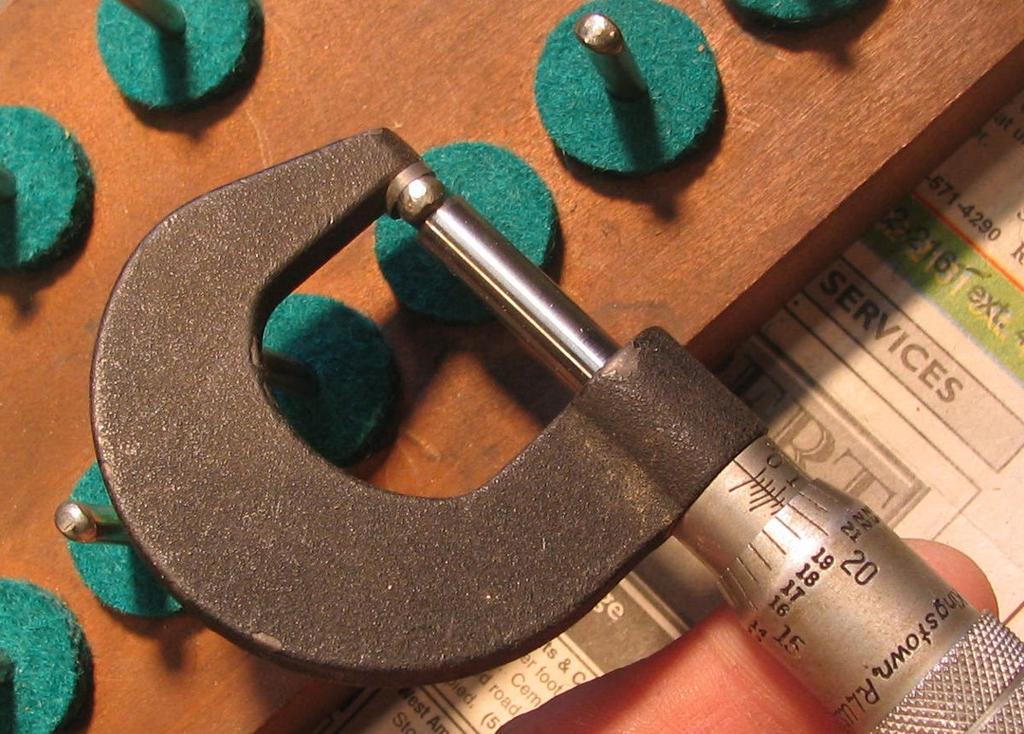 The original thickness of felt is used as a starting point in choosing a felt which will provide a snug fit for the keys without being so tight as to cause binding.