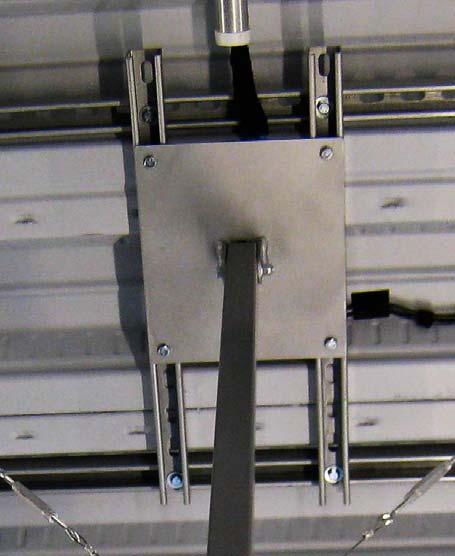 and mount weighing up to 30 pounds. Generally, two parallel pieces of unistrut, 4 to 6 feet long and 1 foot apart, mounted on the structural slab ceiling should be sufficient (fig. 2). A single 1.
