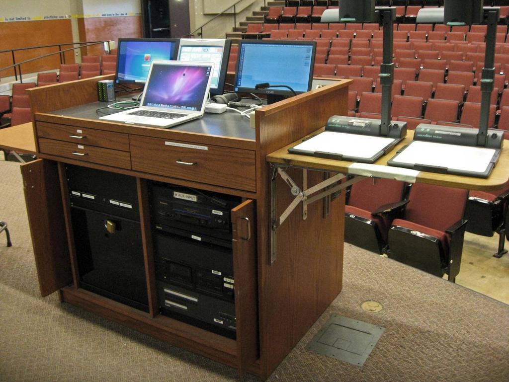 4 inches, and open on top. The media lectern bottom has a large opening to allow passage of cables.