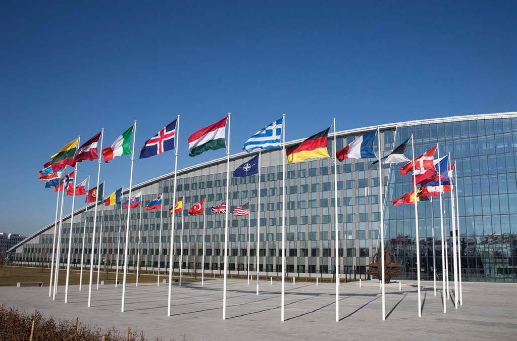 Flags-area outside positions 26 stand-up positions are available in the flags-area outside the new NATO HQ providing a backdrop of the 29 Allied flags and the headquarters façade.