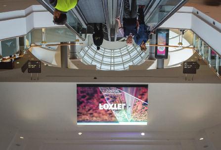 Australia s first, large-scale light transparent media façade, one that allows a view to the outside world from behind a stunning LED image shown on
