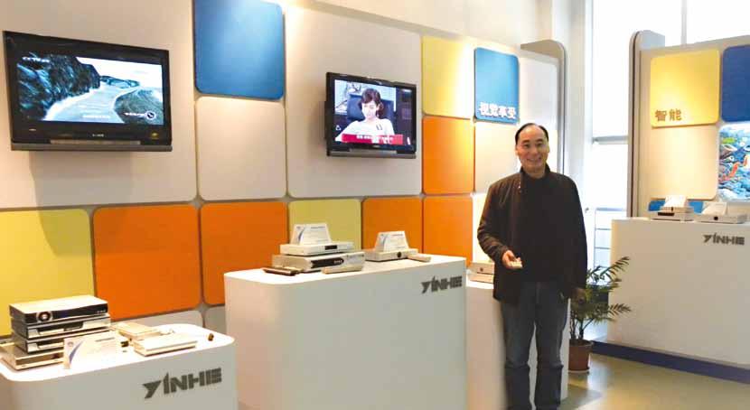Jianbiao Zhu, Overseas Marketing Manager, in YINHE s showroom. Samples from the production line are on display here.