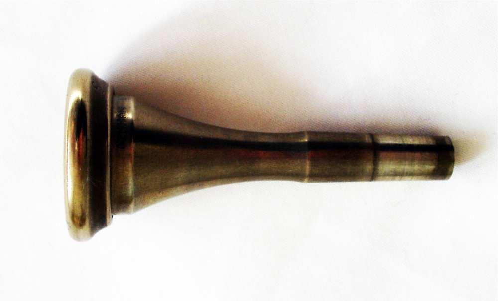 2.1. The resonator direction in which the bell faces. 2.1.3 The mouthpiece A typical horn mouthpiece is shown in figure 2.5.