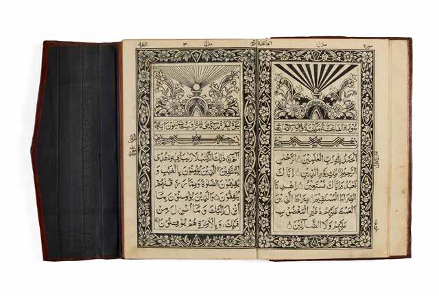 Lot 22 22 An Indian Qur an, after Haji Muhammad Sa id Tajir, lithographed in Arabic and Urdu [Eastern India, (12)85AH (1868-69 AD)] single volume, complete with chromolithographed covers to front and