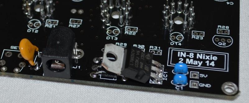 Align the white band on the components with the band marked on the PCB.