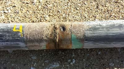 However, all of the girth welds joints had been coated with a tape wrap. This wrap was removed or wiped off while the pipe was being pulled through the bore leaving the entire heat effected zone bare.