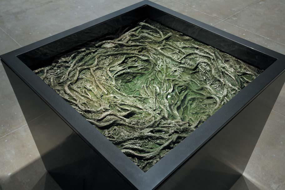 Cristina Iglesias, Bajo la superficie (Under the Surface), 2011. Resin with bronze powder, motor, water, metallic structure, stainless steel container, electrical system.