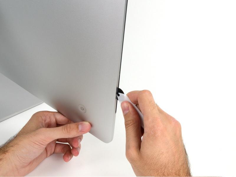 The hub on the imac Opening Tool will keep you from pushing the wheel in too far.