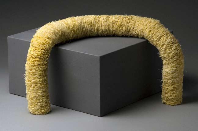 12 (Figure 7) Axis, 2007, muslin and beeswax, 53 x 4 x 4 inches