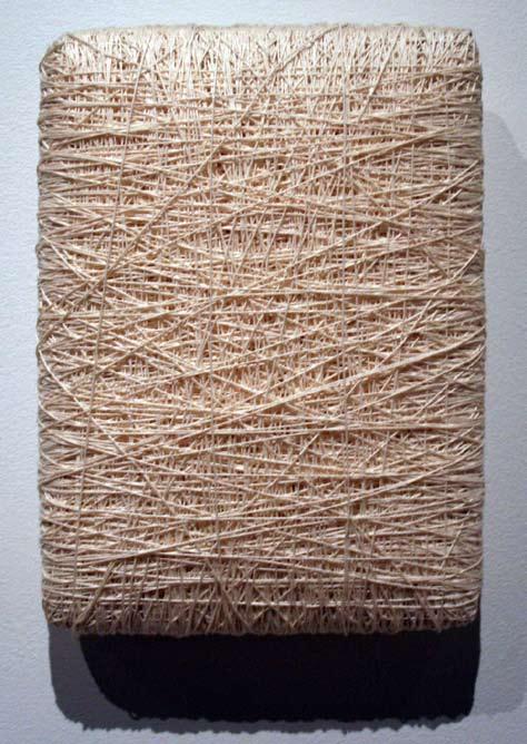 (Figure 8) Dictionary, 1998, dictionary and string, 9 ½ x 7 x 2 inches.