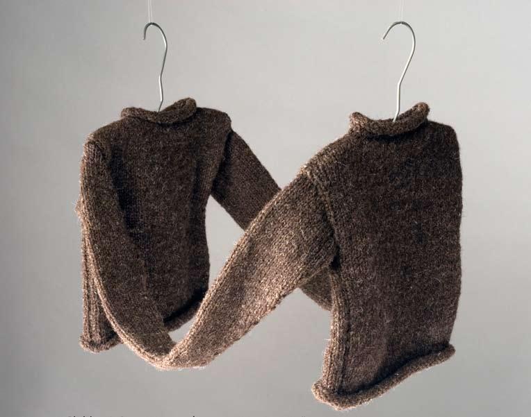 (Figure 2) Children s Sweaters, 2007, wool and hangers, 18 x