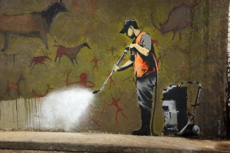 Artist's Name: True identity unknown, known as Banksy Title: Graffiti Style movement: Postmodern