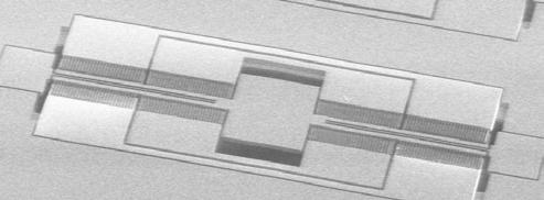 10 µm 100 µm Down combs Middle 20 µm Up combs Figure 6. SEM of resulting structures after complete fabrication described in Sec.
