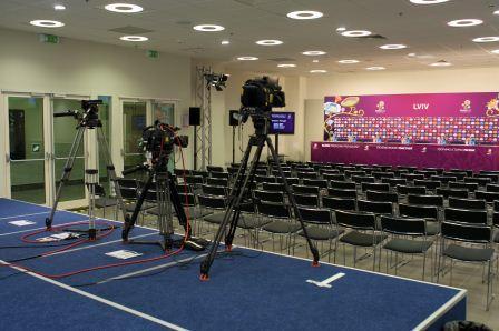 The following facilities must be provided: A podium with tables and chairs large enough to accommodate at least five people and the European Qualifiers backdrop A camera platform that will