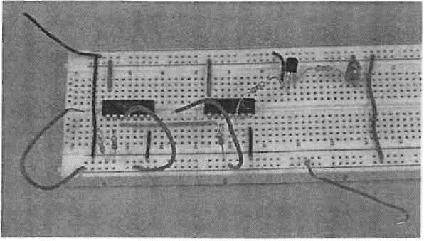 Figure 10.8 Photograph of the partially complete circuit. Complete the following timing diagram and verify the results by testing your circuit.