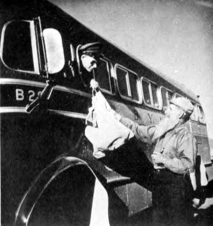 30 Hugh Delaney Figure 18. Sourdough gets mail from byn bus driver toric site in Dawson.