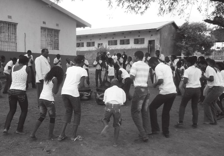 TRANSCRIBING THE VENDA TSHIKONA REEDPIPE DANCE by ANDREW TRACEY and LAINA GUMBORESHUMBA Figure 1. Mr. T.V. Netshivhale rehearsing the Sundani Primary School Tshikona Group, Limpopo Province.