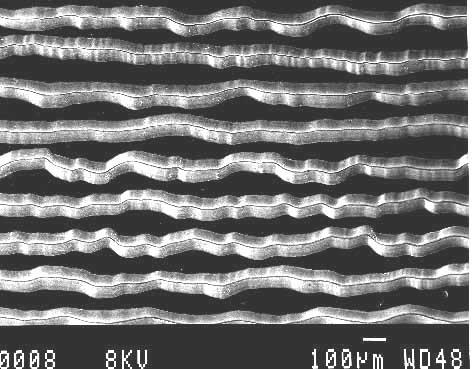 Microphotograph of grooves in a phonograph record. The area shown is about 2 millimeters (1/12 inch) wide.