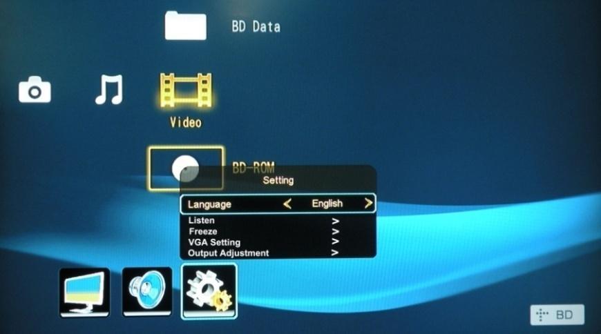7.3. System Setting The Third icon from left of OSD menu is the system setting, includes the OSD language setting, audio listen only, freeze output image, VGA setting, output adjustment etc.
