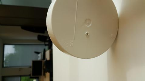 the sensor NFC antenna (almost touching) to enable NFC communication.
