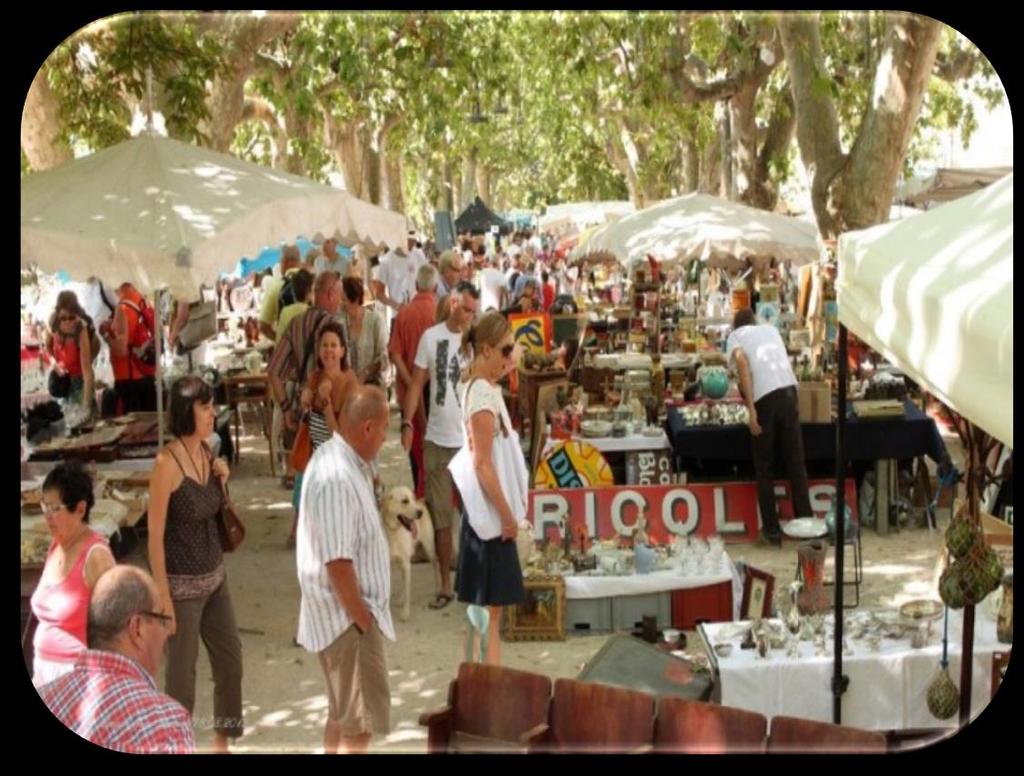 Q18. Flea market. A street market selling second hand goods, A market where inexpensive goods are sold or bartered.