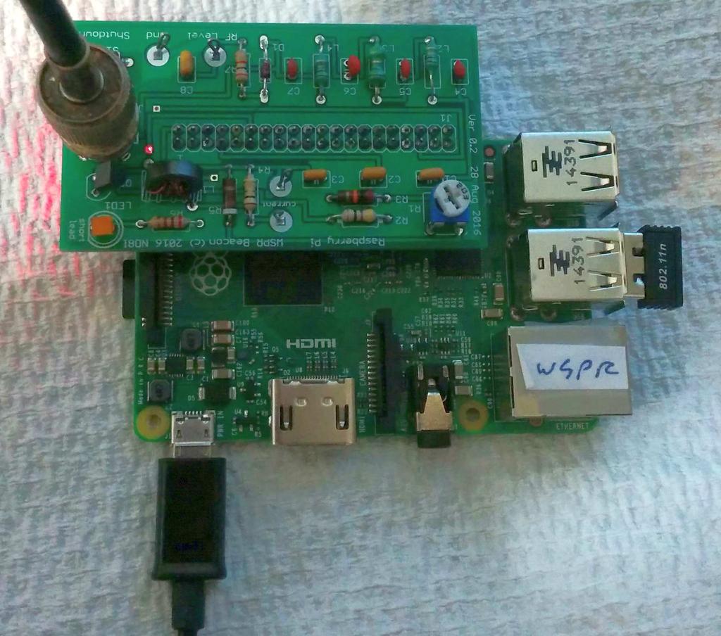 The finished assembly is shown in Figure 10: WSPR Beacon. This is the AFB plugged into an rpi 2.0. The micro USB power connector is coming out of the lower left.