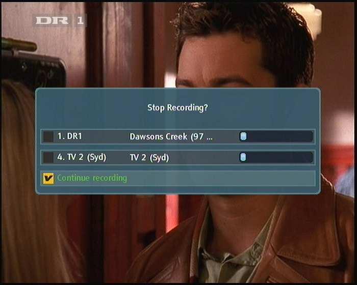 44 Recording and Playback To stop recording, press the button, then a box like the left figure appears, showing the programmes currently being recorded If you select one, its recording will stop 712