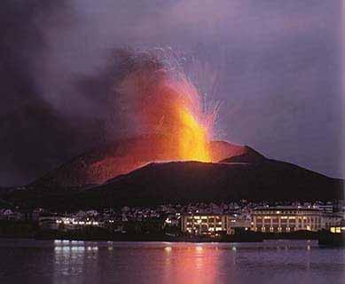 HUGE VOLCANO THREATENS HEIMAEY In late December, 1973, the volcano overshadowing the fishing port of Heimaey, Westmann Islands (Iceland), erupted.
