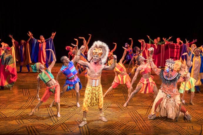 Gerald Caesar as Simba and company in THE LION KING North American Tour. Disney.