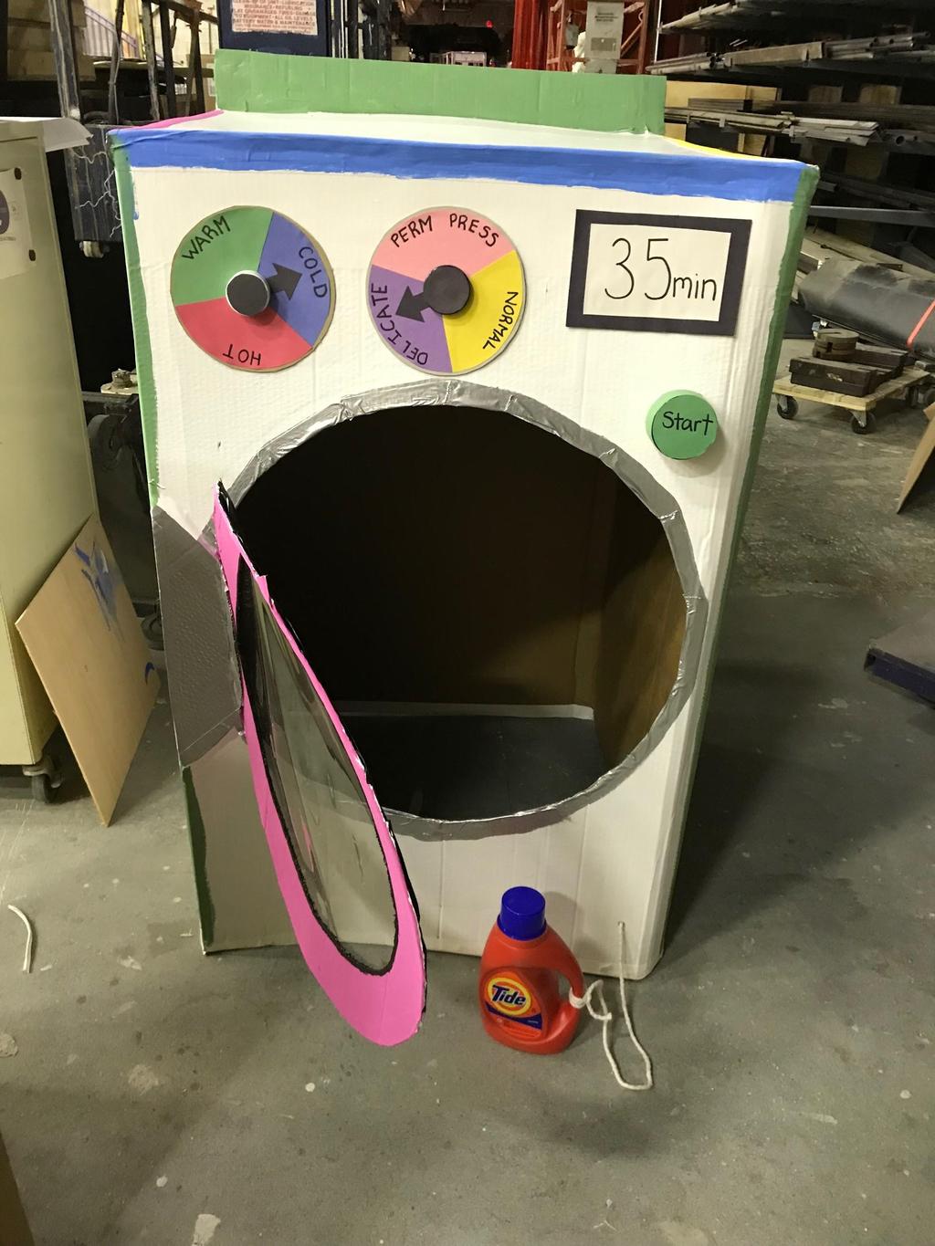 or play with a pretend washing machine in the