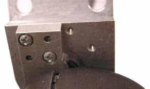 Remove two phillips screws from rotation stop (See