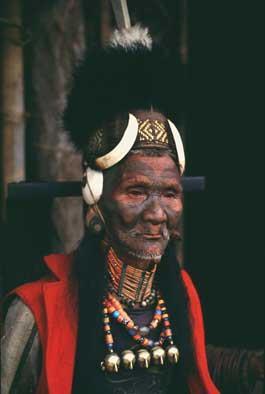 Tattoos for women indicated a kind of rite of passage while for men, a symbolic part of their status in head-taking. Headgears, cowries, feathers and tattoos used indicate their warrior status.