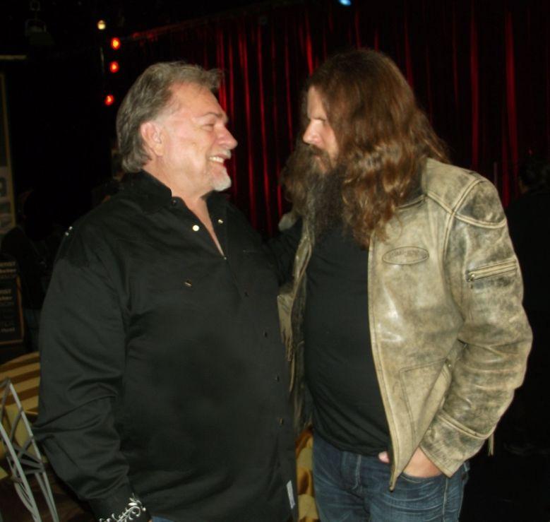 Page 2 IN COLOR Photo Left: Gene shares a few stories with Mercury recording artist, Jamey Johnson at the Bill Anderson Tribute