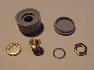 The knob itself has six components! Apart from the grey plastic knob and lid there are four metal components as follows. From left... The bush has an indent that aligns it in the base of the knob.