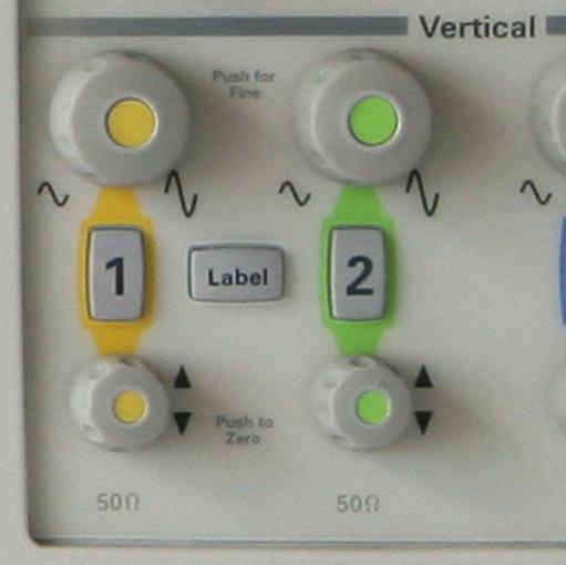 Demo Board Getting Started Guide 4 Vertical Controls: a Turn the large yellow knob in the Vertical section to control the V/div setting.