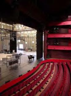 Three balconies encircle the theatre, seating the audience close to the stage.