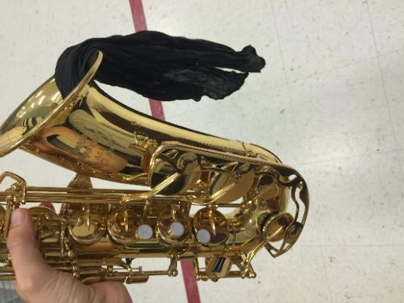 Always remove your saxophone from the case by the bell, not by the keys.