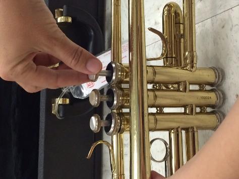 Lubricate your valves: Trumpet Maintenance 1. Unscrew the valve cap and pull the valve out about halfway. 2.