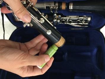 Be careful not to squeeze the rods along the side of the clarinet when putting it together.